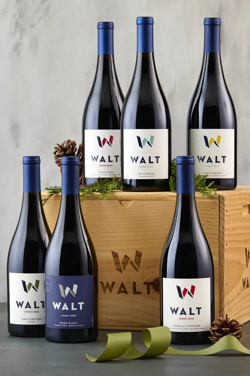 Image of the WALT Ultimate Pinot Collectors Holiday Set featuring 6 bottles of single vineyard WALT Pinot Noir packaged beautifully in a wooden collectors box.